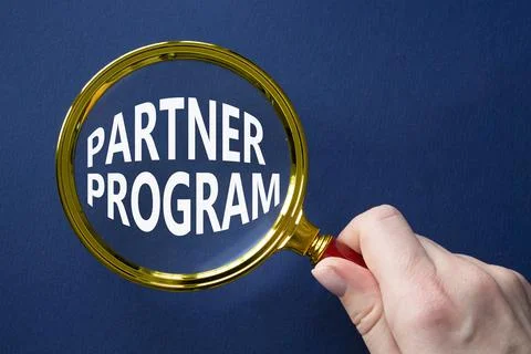 Partner Program symbol. Concept words Partner Program on magnifying glass. .. Stock Photos