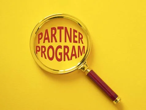 Partner Program symbol. Concept words Partner Program on magnifying glass. .. Stock Photos