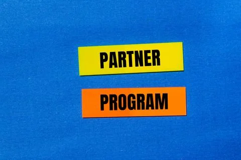 Partner program words written on colorful stickers with blue background Stock Photos