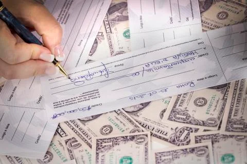 Partner signed a check Stock Photos
