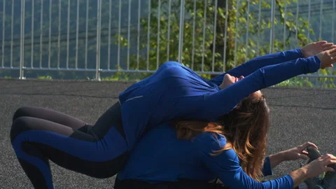 Partner stretching exercise Stock Footage 150002571