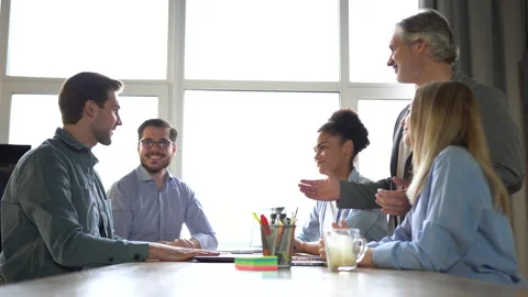 Partners introducing coming at group meeting, businessman shake hands Stock Footage 171789286
