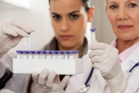 Partners with tubes looking at the camera Stock-Fotos