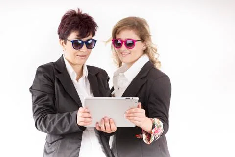 Partners work together with the tablet Stock Photos