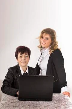 Partners work together wiit the computer Stock Photos