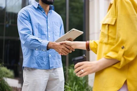 Partnership Handshake Outside Office Stock Photos