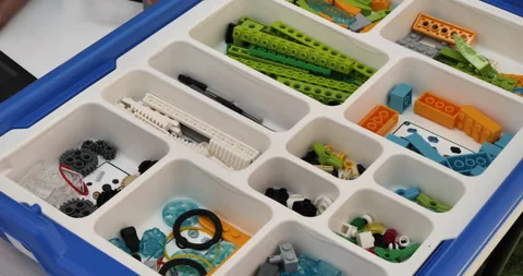 Parts of constructor for building electrical circuits are in independent boxes Stock Footage 277610890