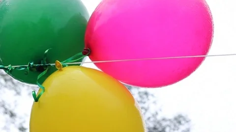 Party balloons in rain Stock Footage 70791987