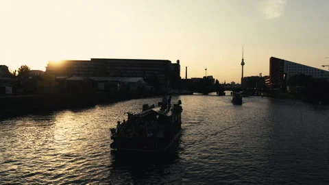 Party Boat On Spree River Berlin Sunset TV Tower Drone View - Sep 17 2024 Stock-Footage 328740034