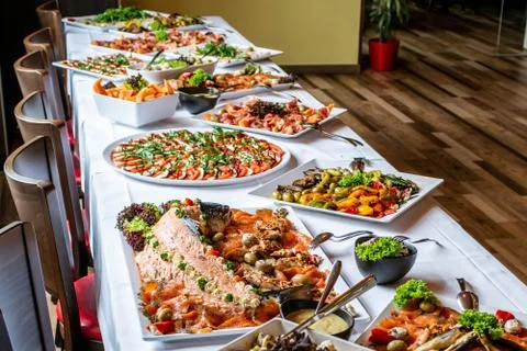 Party Brunch big Buffet table setting with Food Meat Vegetables Stock Photos