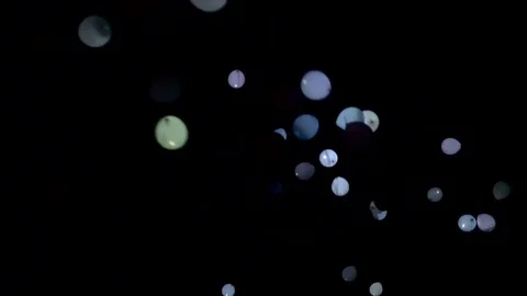 The party came to an end. A group of people lets out balloons back to the sky Stock Footage