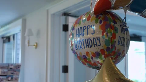 Party Decorations In Cozy Setting, Decorative Party Elements Creating Warm Stock Footage 323777911