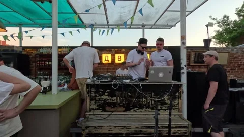 Party with DJs on an outdoor summer, techno, electronic music, 08/28/23 Stock Footage 273350239