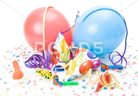 Party hats, horns or whistles, confettis and balloons on white background.. Stock Photos