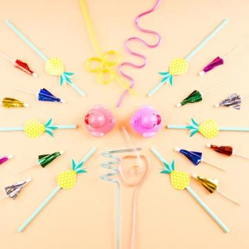 Party items circle composition on orange Stock Photos