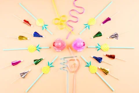 Party items circle composition on orange Stock Photos