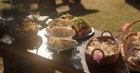 Party table with drinks and sweets . Wedding decor at an exit ceremony Stock Footage 118086714