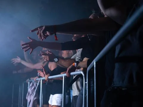 Partycrowd in front of stage Stock-Fotos
