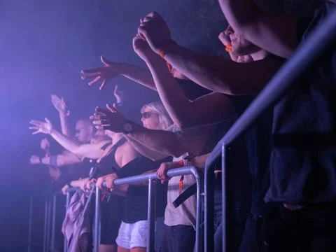 Partycrowd in front of stage Stock-Fotos