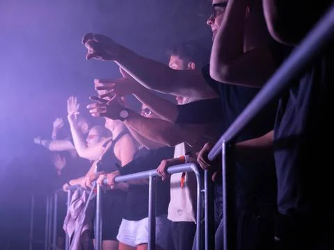 Partycrowd in front of stage Stock-Fotos