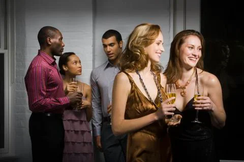 Partygoers socializing Stock Photos