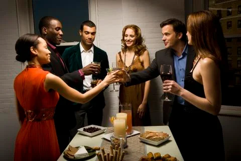 Partygoers toasting Stock Photos