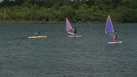 Pasadena, TX, US - August 13, 2022: Two adult females learning to wind surf. Stock-Footage 204741818