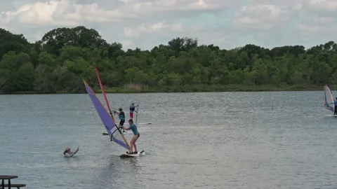 Pasadena, TX, US - August 13, 2022: Adult females learning to windsurf. Stock-Footage 204745580