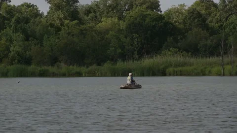 Pasadena, TX, US - July 04, 2022: A senior male kayaker fishing. Stock-Footage 202771119