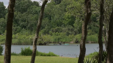 Pasadena, TX, US - June 05, 2022: A shot of Kayaker fishing on Armand Bayou. Stock-Footage 196874469