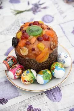 Pasca, Easter cake with painted eggs Stock Photos