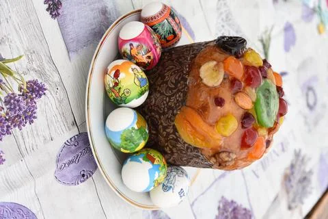 Pasca, Easter cake with painted eggs Stock Photos