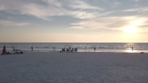 Pass-A-Grille Beach FL  Pan to The Don CeSar at Sunset Stock Footage 241760568