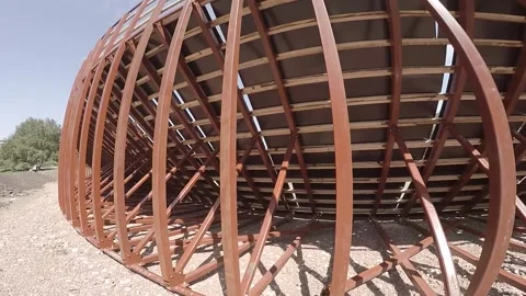 Pass next to the metal frame. Slow motion. Stock Footage 95040239