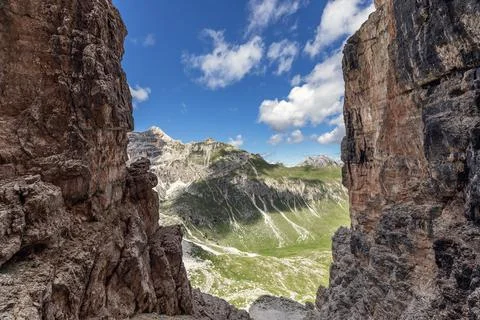 Pass through the cliffs of the Dolomites Alps. Summer, beautiful sunny day Stock Photos