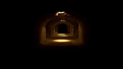 Pass through a long and dark Roman basement. Basement under the Amphitheater in Video stock 120305462