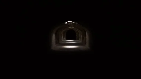 Pass through a long and dark Roman basement. Basement under the Amphitheater in Stock Footage 120305612