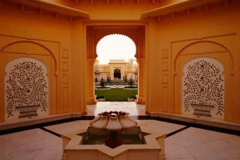 Passage to arch and view on yard. Stock Photos