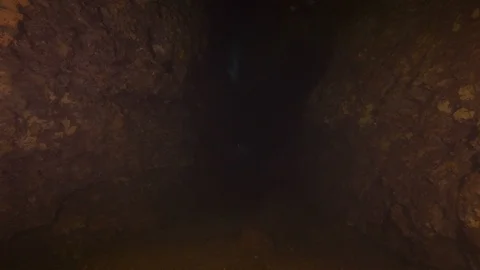 Passage between rocks to discover diver, Banco Santa Croce, Mediterranean Sea Stock Footage 104680258