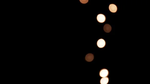 Passage of blurred lights on the side of the black screen. Stock Footage 99874413