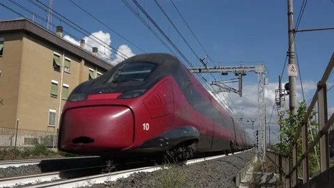 Passage of a Italo train. View at the height of the tracks. High speed transp Stock Footage 206346141
