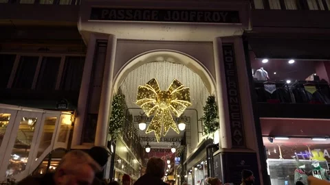 Passage Jouffroy Paris Dec 2 2023 with giant Christmas bow and decorations Stock Footage 314891636