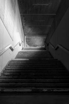 Passage stairways in low light Stock Photos