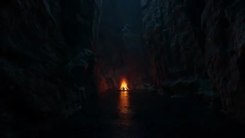 Passage through dark cave with burning bonfire Stock Footage 318281717