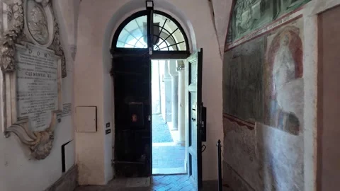 Passage Through An Old Stone Tunnel Into A Sunny Italian Courtyard In Rome Stock Footage 337413073