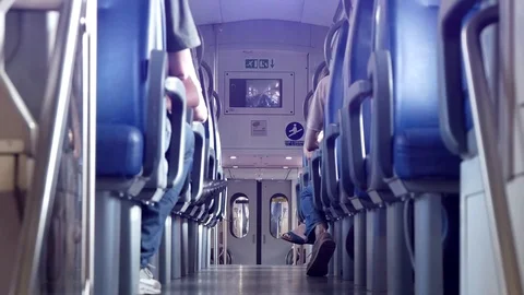 Passage In A Train Car Riding With Seated Passengers Stock Footage 127540945