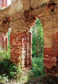 Passages in the old wall. Stock Photos