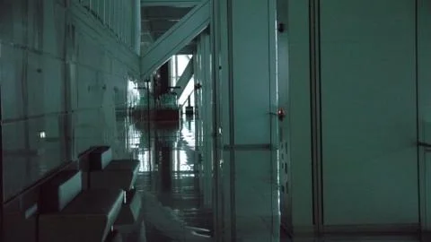 A passageway in a large building Stock Photos