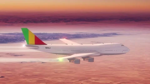 Passanger Plane Flying over Desert with Country Flag Mali Stock Footage 286334056