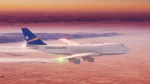Passanger Plane Flying over Desert with Country Flag Marshall Islands Stock Footage 286334059